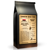 Raja Toba Sumatra coffee bag featuring a medium dark roast with tasting notes of fruity, herbal, and spicy flavors.