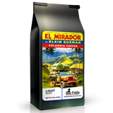 El Mirador Colombian Coffee by Elkin Guzman, light roast packaging featuring a scenic landscape.
